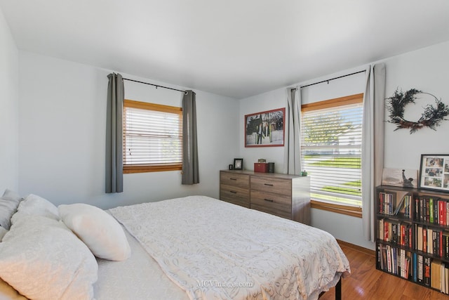16810 Highview Ave, Orland Hills, IL 60487 - bedroom featuring multiple windows and wood finished floors