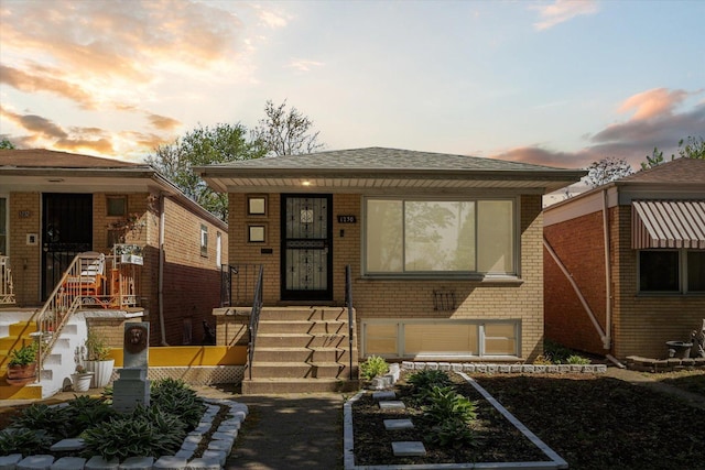 1230 W 112th Pl, Chicago, IL 60643 - bungalow-style house featuring brick siding and roof with shingles