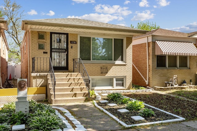 1230 W 112th Pl, Chicago, IL 60643 - bungalow-style home with brick siding and a shingled roof