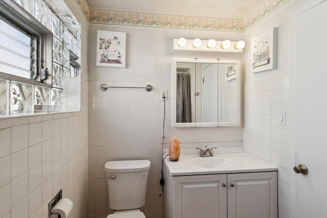 1230 W 112th Pl, Chicago, IL 60643 - bathroom with tile walls, vanity, and toilet
