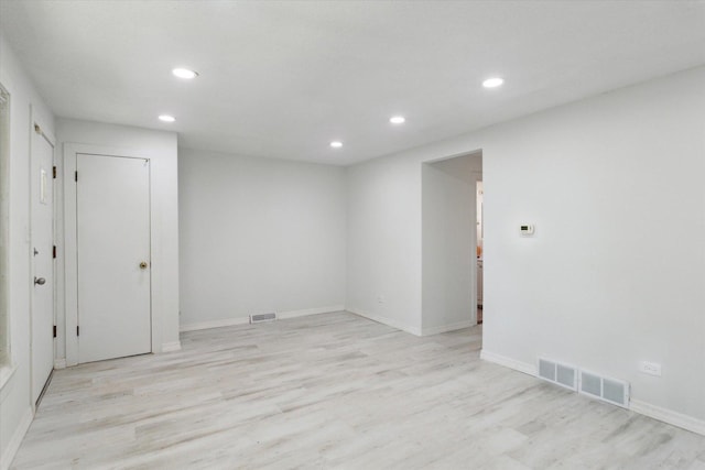 1230 W 112th Pl, Chicago, IL 60643 - empty room featuring light wood finished floors, recessed lighting, and baseboards