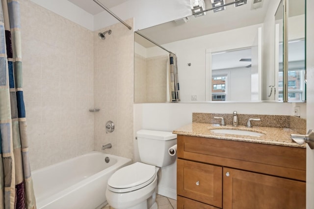 bathroom with shower / tub combo with curtain, toilet, and vanity