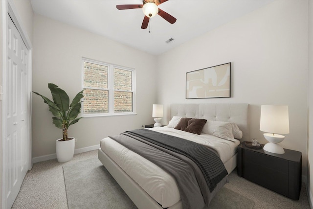 6640 S Kimbark Ave Unit 3, Chicago, IL 60637 - carpeted bedroom with baseboards, a closet, and a ceiling fan