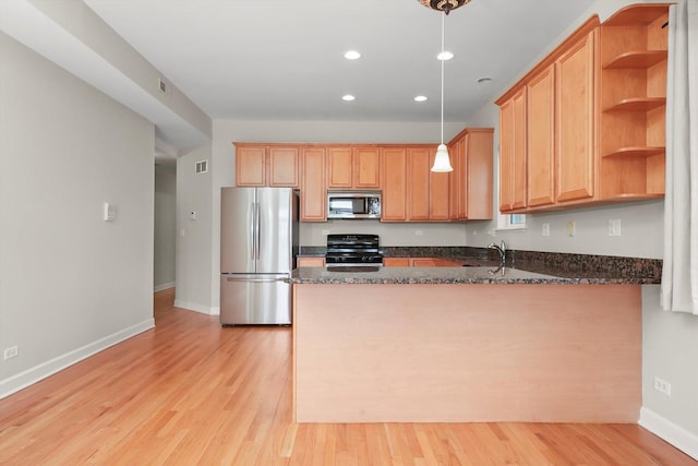 6640 S Kimbark Ave Unit 3, Chicago, IL 60637 - kitchen featuring appliances with stainless steel finishes, open shelves, a peninsula, recessed lighting, and dark stone countertops
