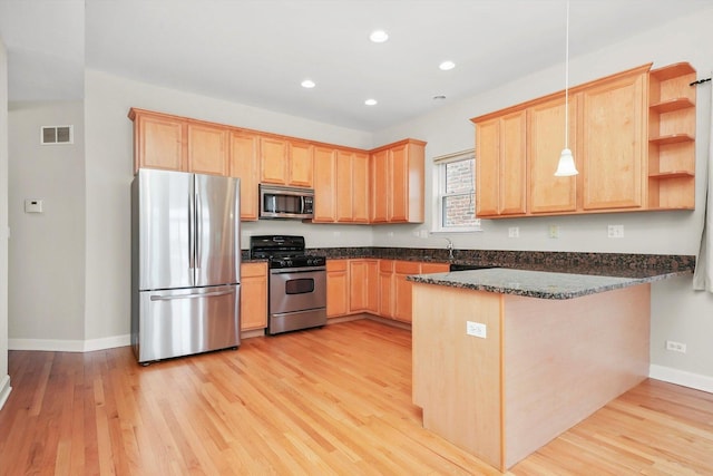 6640 S Kimbark Ave Unit 3, Chicago, IL 60637 - kitchen featuring stainless steel appliances, light brown cabinets, a peninsula, recessed lighting, and light wood finished floors