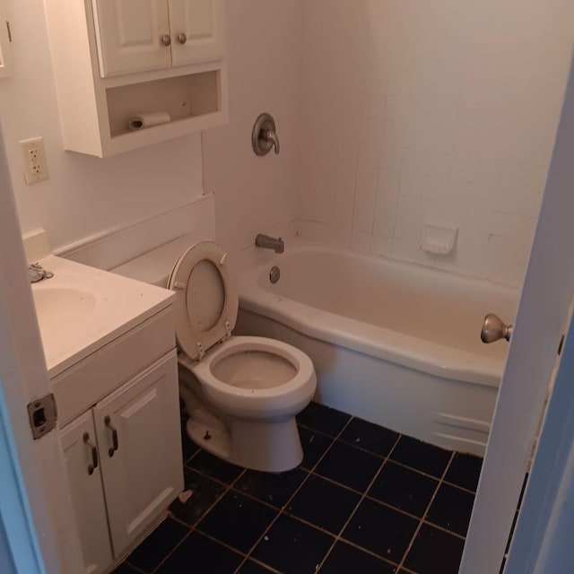 430 Spring Ave, Dekalb, IL 60115 - bathroom featuring tile patterned floors, vanity, toilet, and  shower combination