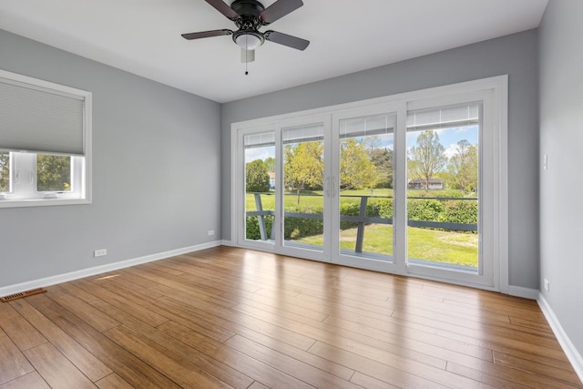 50 Kendal Rd, Elk Grove Village, IL 60007 - spare room featuring a ceiling fan, baseboards, and wood finished floors