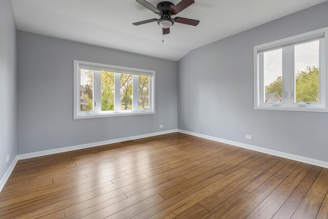50 Kendal Rd, Elk Grove Village, IL 60007 - spare room with baseboards, hardwood / wood-style flooring, and ceiling fan