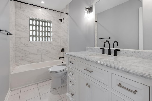 50 Kendal Rd, Elk Grove Village, IL 60007 - bathroom with tub / shower combination, toilet, tile patterned flooring, vanity, and baseboards