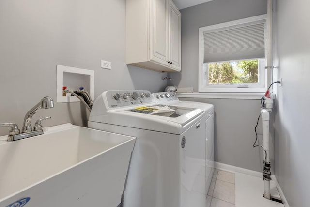 50 Kendal Rd, Elk Grove Village, IL 60007 - laundry area with cabinet space, washing machine and dryer, light tile patterned flooring, and baseboards
