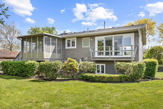 50 Kendal Rd, Elk Grove Village, IL 60007 - rear view of property with a sunroom and a yard