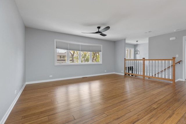 50 Kendal Rd, Elk Grove Village, IL 60007 - unfurnished room featuring ceiling fan, wood finished floors, and baseboards