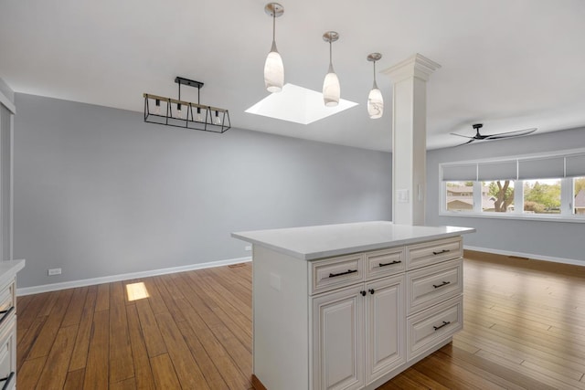 50 Kendal Rd, Elk Grove Village, IL 60007 - kitchen featuring hardwood / wood-style flooring, ceiling fan, and baseboards