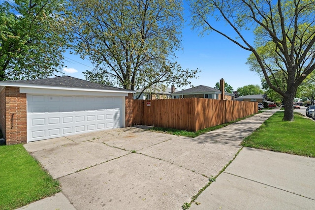 garage with fence