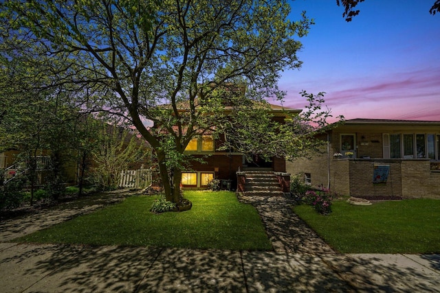 3732 Wisconsin Ave, Berwyn, IL 60402 - view of front of property with a yard and brick siding
