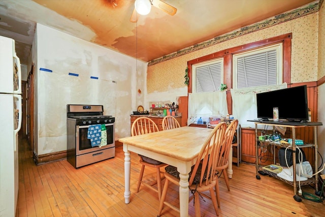 3732 Wisconsin Ave, Berwyn, IL 60402 - dining area with wallpapered walls, light wood-type flooring, and ceiling fan