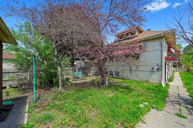 3732 Wisconsin Ave, Berwyn, IL 60402 - view of side of property featuring fence and a chimney