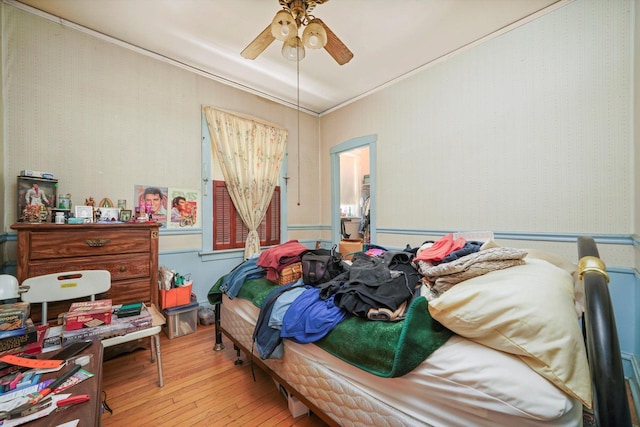 3732 Wisconsin Ave, Berwyn, IL 60402 - bedroom with wood-type flooring, ceiling fan, and ornamental molding