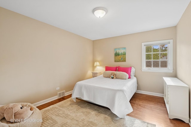 11 Longmeadow Rd, Winnetka, IL 60093 - bedroom with baseboards and light wood-type flooring