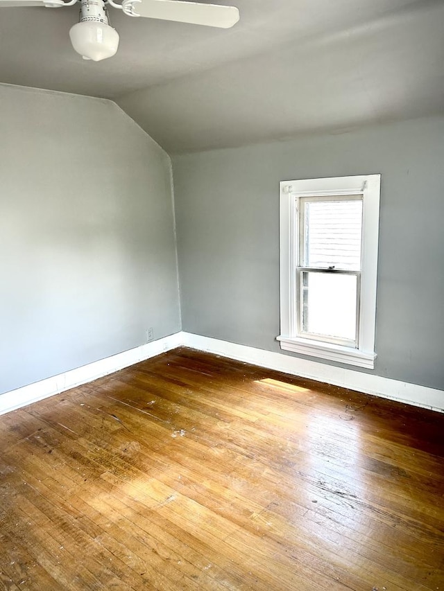 1258 Perry St, Des Plaines, IL 60016 - unfurnished room featuring wood-type flooring, a ceiling fan, and vaulted ceiling