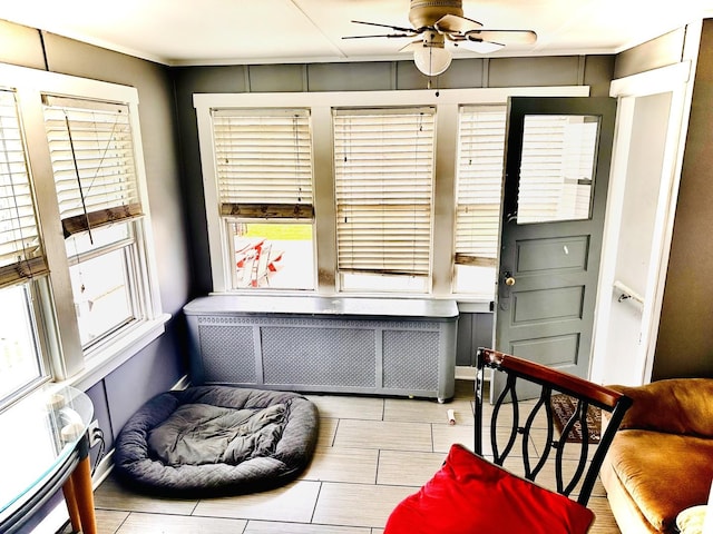1258 Perry St, Des Plaines, IL 60016 - sitting room with ceiling fan, plenty of natural light, wood finished floors, and baseboards
