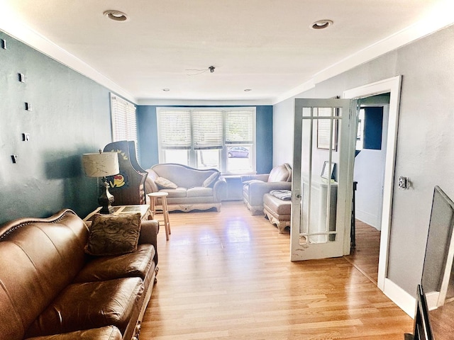 1258 Perry St, Des Plaines, IL 60016 - living room with healthy amount of natural light, light wood finished floors, ornamental molding, and baseboards