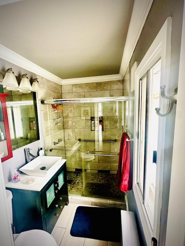 1258 Perry St, Des Plaines, IL 60016 - full bath with plenty of natural light, a stall shower, ornamental molding, and vanity