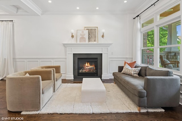 1931 W Barry Ave, Chicago, IL 60657 - living room with a fireplace with flush hearth, ornamental molding, a decorative wall, wood finished floors, and a wainscoted wall