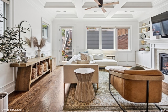 1931 W Barry Ave, Chicago, IL 60657 - living room with ornamental molding, wood finished floors, a fireplace, ceiling fan, and a decorative wall