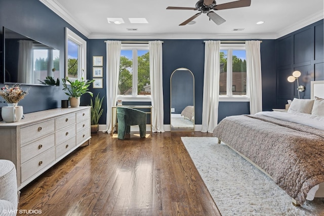 1931 W Barry Ave, Chicago, IL 60657 - bedroom featuring multiple windows, dark wood-style flooring, baseboards, and crown molding