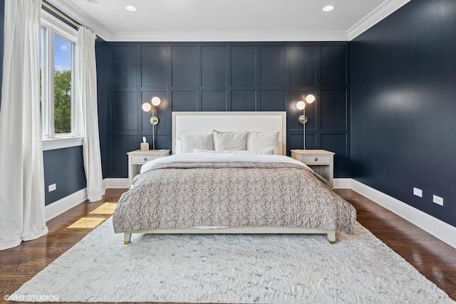 1931 W Barry Ave, Chicago, IL 60657 - bedroom with a decorative wall, crown molding, dark wood-style floors, baseboards, and recessed lighting
