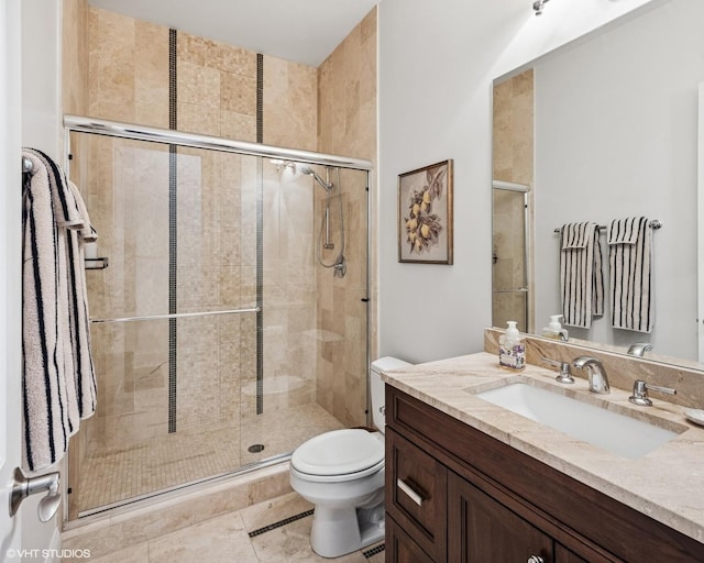 1931 W Barry Ave, Chicago, IL 60657 - full bath featuring vanity, toilet, a shower stall, and tile patterned flooring