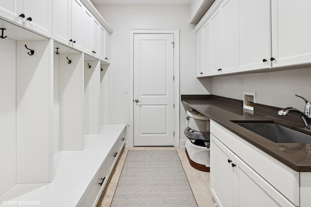 1931 W Barry Ave, Chicago, IL 60657 - laundry room with cabinet space and washer hookup