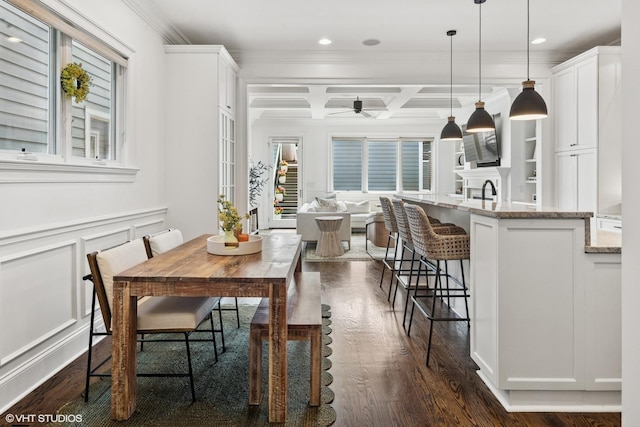 1931 W Barry Ave, Chicago, IL 60657 - dining space featuring crown molding, dark wood-style flooring, coffered ceiling, plenty of natural light, and beam ceiling