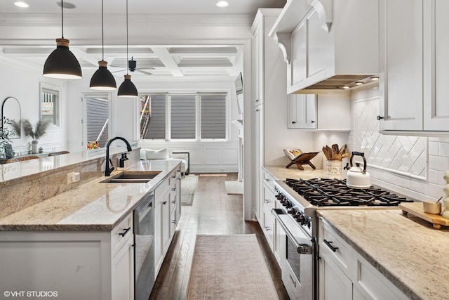 1931 W Barry Ave, Chicago, IL 60657 - kitchen featuring appliances with stainless steel finishes, a sink, white cabinets, decorative backsplash, and coffered ceiling
