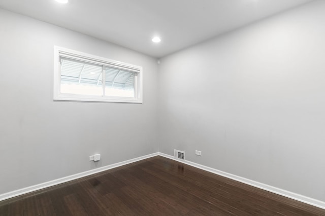 2317 Forest Ave, North Riverside, IL 60546 - spare room featuring baseboards, dark wood-type flooring, and recessed lighting
