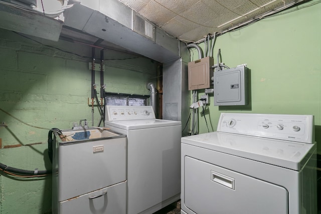 2317 Forest Ave, North Riverside, IL 60546 - laundry room with separate washer and dryer, electric panel, and concrete block wall