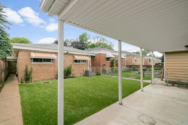 2317 Forest Ave, North Riverside, IL 60546 - view of yard with a patio, central air condition unit, and a gate