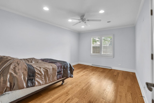 6801 N Lexington Ln, Niles, IL 60714 - bedroom with baseboard heating, recessed lighting, baseboards, wood finished floors, and crown molding