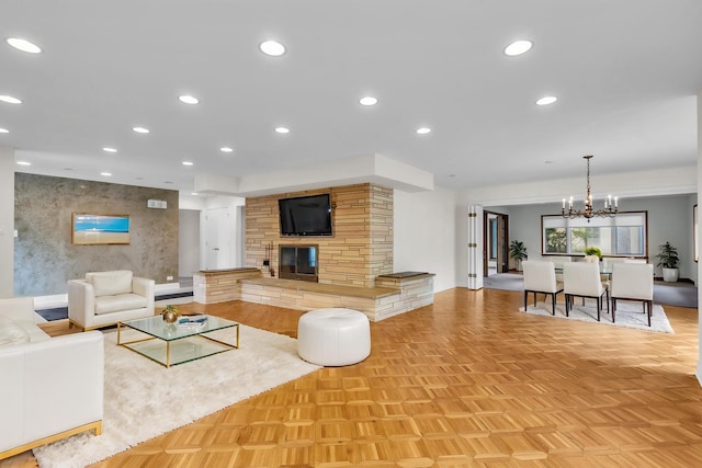 6801 N Lexington Ln, Niles, IL 60714 - living area featuring a stone fireplace, a chandelier, and recessed lighting