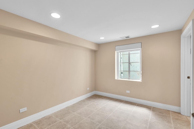 6801 N Lexington Ln, Niles, IL 60714 - empty room featuring baseboards, recessed lighting, and light tile patterned flooring