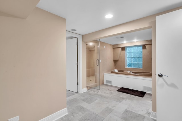 6801 N Lexington Ln, Niles, IL 60714 - full bathroom featuring a shower stall, a garden tub, and baseboards