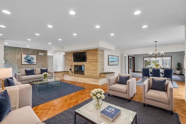 6801 N Lexington Ln, Niles, IL 60714 - living area featuring a stone fireplace, a chandelier, and recessed lighting