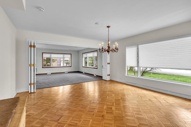 6801 N Lexington Ln, Niles, IL 60714 - unfurnished room featuring baseboards, a chandelier, and a smoke detector