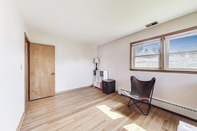 929 N Delphia Ave, Park Ridge, IL 60068 - sitting room with light wood-style flooring and baseboards