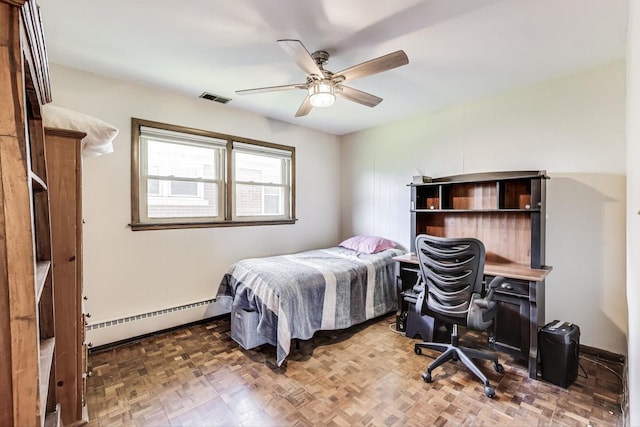 929 N Delphia Ave, Park Ridge, IL 60068 - bedroom featuring a baseboard heating unit and ceiling fan