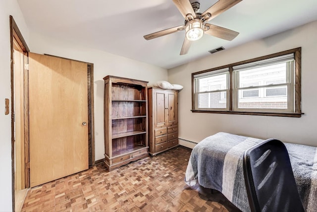 929 N Delphia Ave, Park Ridge, IL 60068 - bedroom featuring a baseboard radiator, ceiling fan, and baseboards
