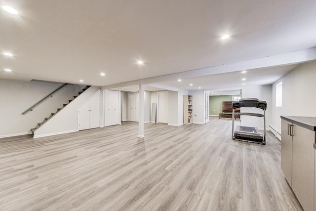 929 N Delphia Ave, Park Ridge, IL 60068 - basement featuring stairway, light wood-style flooring, a baseboard radiator, baseboards, and recessed lighting