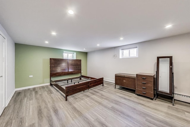929 N Delphia Ave, Park Ridge, IL 60068 - playroom with plenty of natural light, light wood-style flooring, recessed lighting, a baseboard radiator, and baseboards