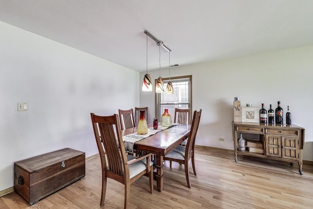 929 N Delphia Ave, Park Ridge, IL 60068 - dining room featuring light wood-type flooring and baseboards
